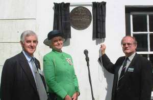 Following his speech, Lord Buckinghamshire unveils the plaque with Lady Mary Holborow and Parish Council Chairman Peter Hardaker